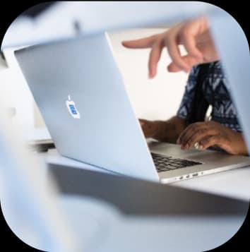 Person using laptop on table